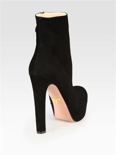 prada suede platform boots.